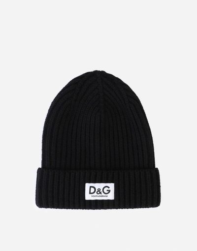 Shop Dolce & Gabbana Ribbed Knit Hat With Logo Label In Black