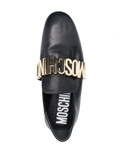 Shop Moschino Logo-plaque Leather Loafers In Black