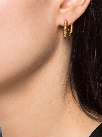 Shop Missoma Twisted Claw Hoop Earrings In Gold