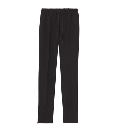 Shop Burberry Logo-embroidered Relaxed Trousers In Black