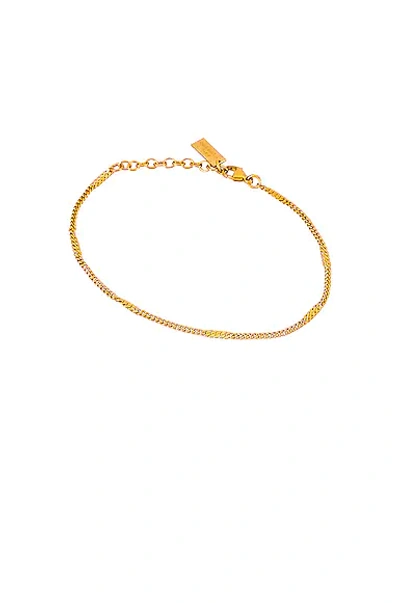Shop Saint Laurent Curb Chain Bracelet In Brass Gold