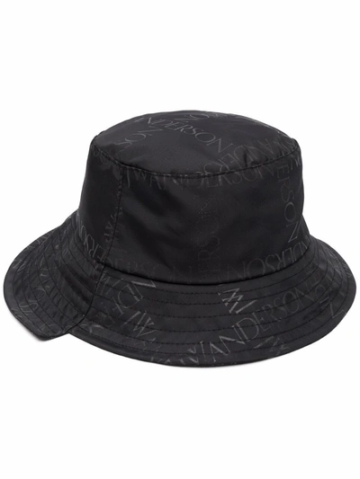 Shop Jw Anderson Asymmetric Logo-print Bucket Hat In Black