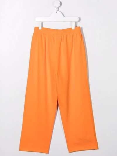 Shop Mm6 Maison Margiela Teen Wide-leg Logo Trousers In Orange