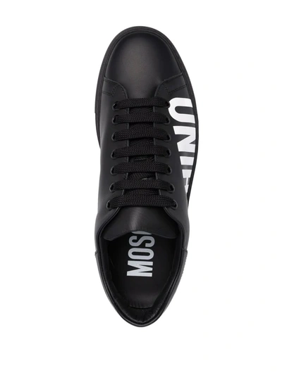 Shop Moschino Logo Print Low-top Sneakers In Black