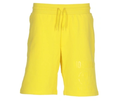 Shop Moschino Logo Printed Drawstring Track Shorts In Yellow