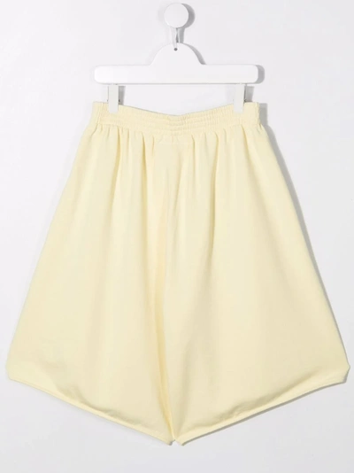 Shop Mm6 Maison Margiela Teen Cotton Drop-crotch Shorts In Yellow
