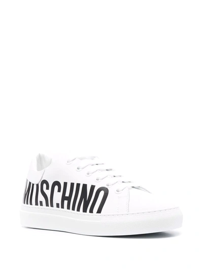 Shop Moschino Logo-print Low-top Sneakers In White
