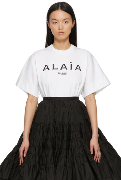 Shop Alaïa White Printed Logo T-shirt Bodysuit In 009 White/black