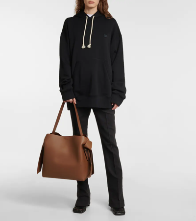 Acne Studios Mini Musubi Leather Top Handle Bag In Camel Brown