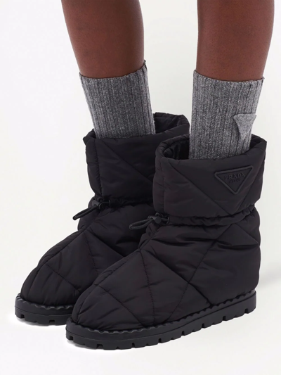 Shop Prada Blow Padded Ankle Boots In Black