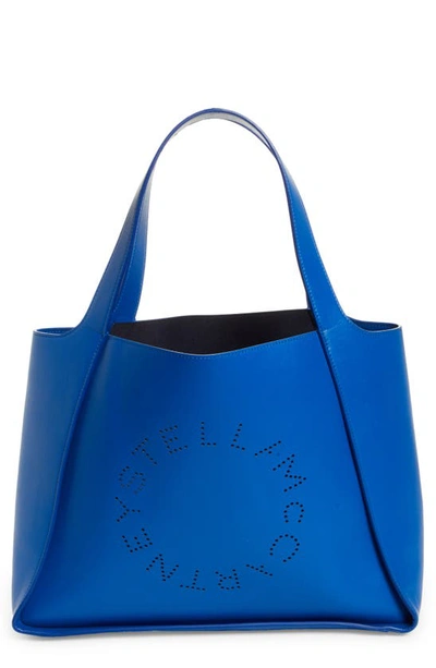 Shop Stella Mccartney Perforated Logo Faux Leather Tote In 4370 Jewel Blue