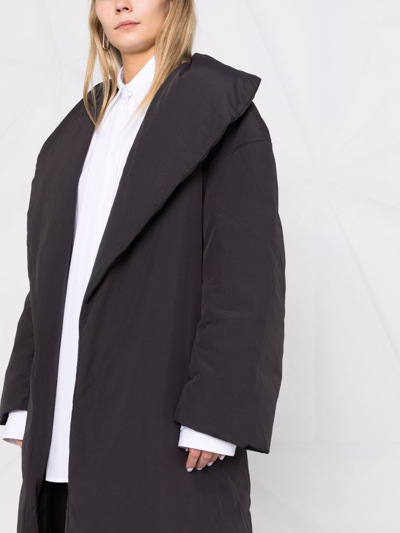 Shop Totême Padded Belted Coat In Schwarz