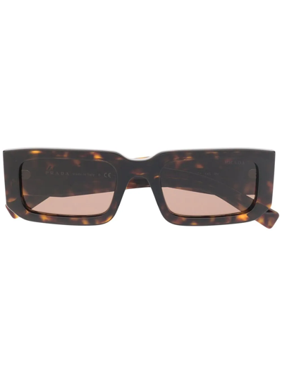 Shop Prada Tortoiseshell-effect Sunglasses In Braun