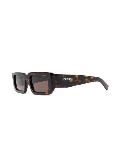 Shop Prada Tortoiseshell-effect Sunglasses In Braun