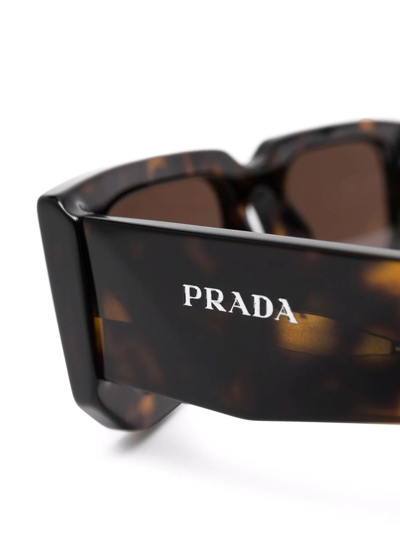 Shop Prada Tortoiseshell-effect Sunglasses In Braun