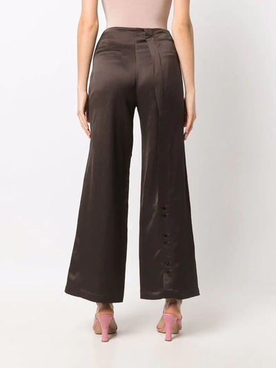 Shop Aeron Crest Button-cuff Palazzo Trousers In Brown