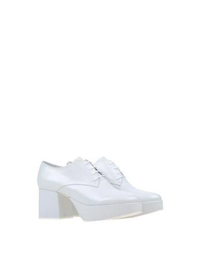 Shop Jil Sander Laced Shoes In White
