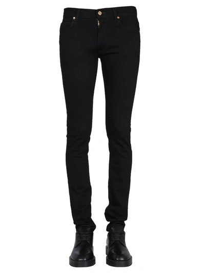 Shop Versace Skinny Fit Jeans In Nero