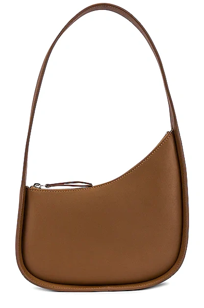 Shop The Row Leather Half Moon Bag In Chestnut