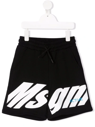 Shop Msgm Logo Print Track Shorts In Black