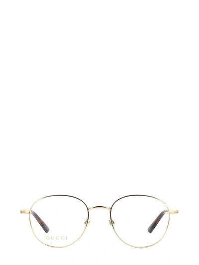 Shop Gucci Gg0392o Gold Glasses