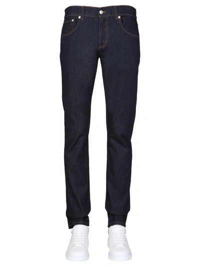 Shop Alexander Mcqueen Jeans With Signature Logo Embroidered In Blu