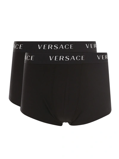 Shop Versace Slip In Black