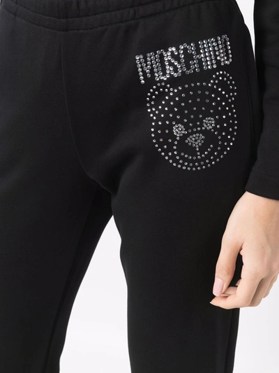 Shop Moschino Gem-embellished Track Pants In Black