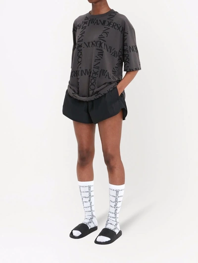 Jw Anderson All-over Logo Print Grey T-shirt In Black