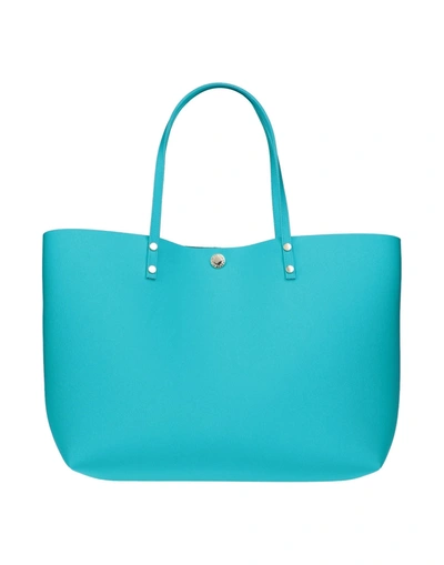 Shop La Fille Des Fleurs Handbags In Turquoise