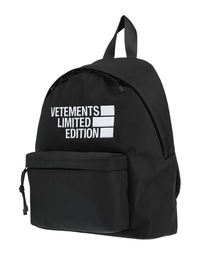 Shop Vetements Backpacks In Black