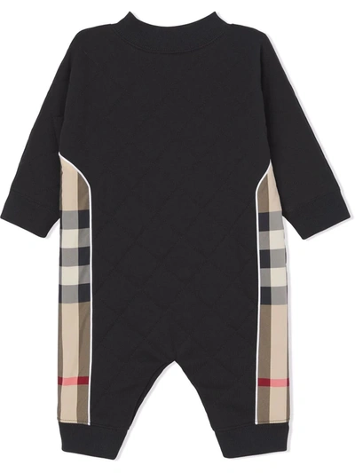 Shop Burberry Check Panel Diamond-quilted Cotton Romper In Black