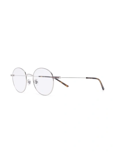 Shop Gucci Oval Round-frame Glasses In Silver