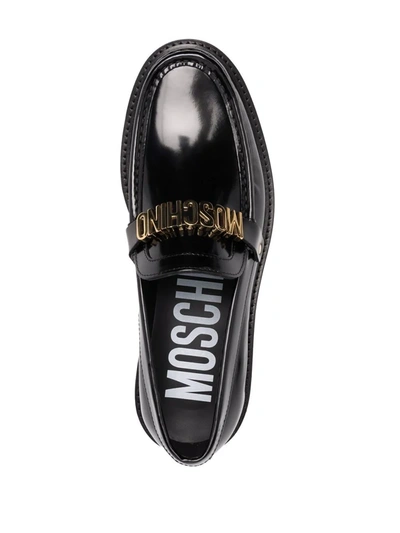Shop Moschino Logo-plaque Leather Loafers In Black