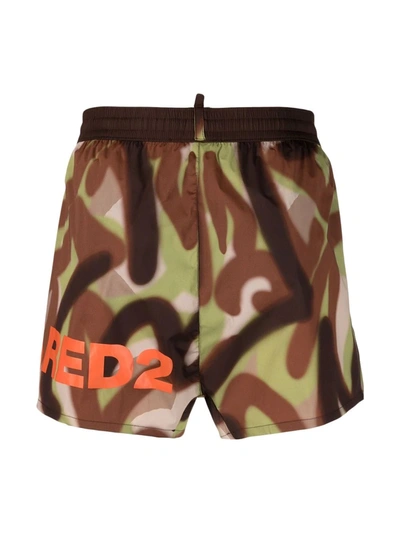 Shop Dsquared2 Spray-paint Effect Swim Shorts In Green