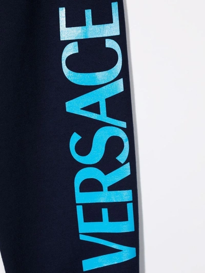 Shop Versace Logo-print Track Pants In Blue