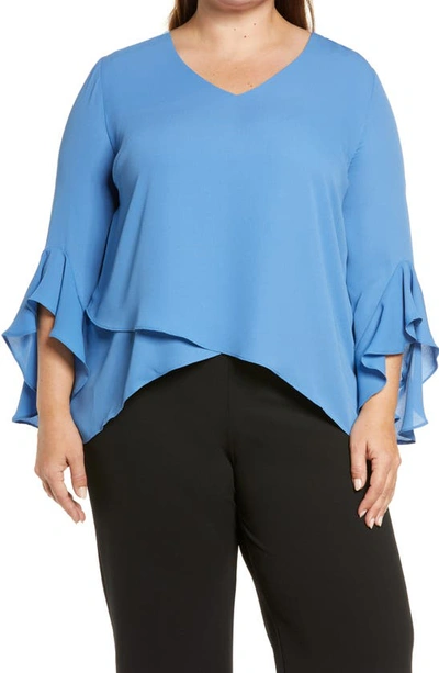 Shop Vince Camuto Flutter Sleeve Crossover Georgette Tunic Top In Steel Blue