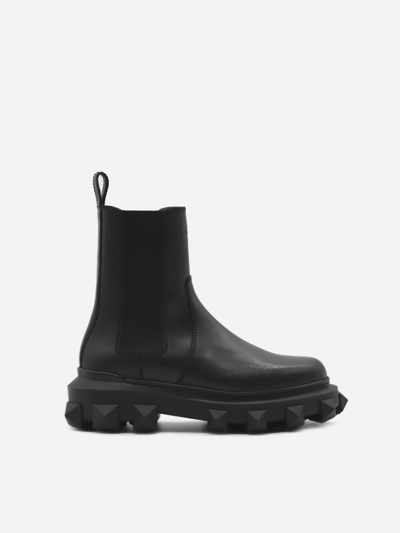 Shop Valentino Garavani Trackstud Chelsea Boots In Leather In Black