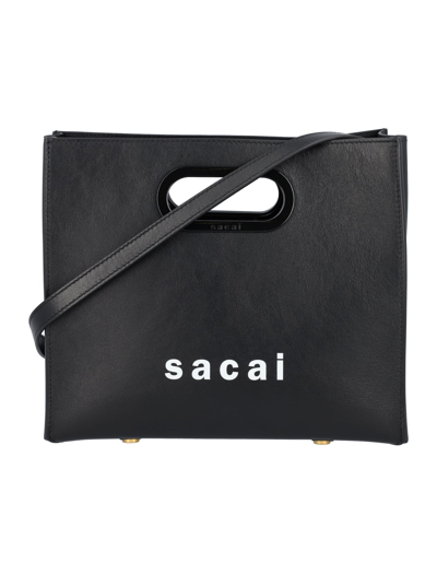 Shop Sacai Logo-print Small Tote Bag In Black
