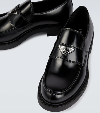Prada Triangle Logo Brushed Leather Loafers In Black
