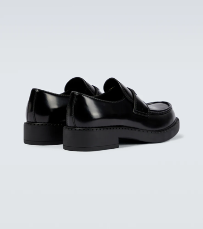 Prada Triangle Logo Brushed Leather Loafers In Black
