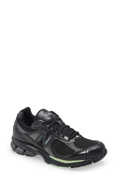 Shop New Balance 2002r Sneaker In Black Green