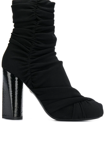 Shop Roberto Cavalli Snakeskin Heel Ankle Boots In Black