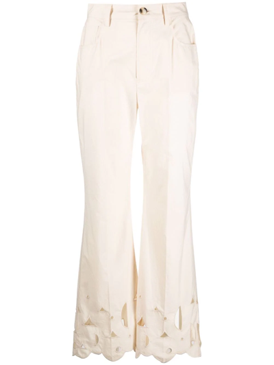 Shop Nanushka Embroidered Flared Trousers In Neutrals