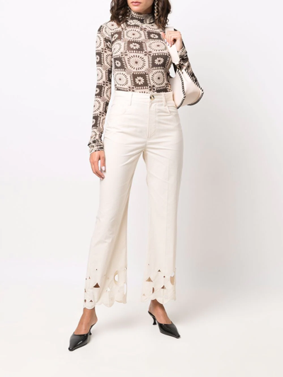 Shop Nanushka Embroidered Flared Trousers In Neutrals