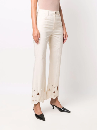 Shop Nanushka Embroidered Flared Trousers In Neutrals