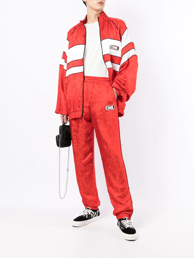 Shop Cool Tm Chainlink Print Track Pants In Red