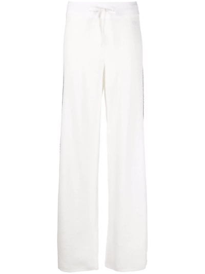 Shop Tommy Hilfiger Side Stripe Knitted Trousers In White