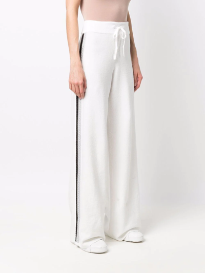 Shop Tommy Hilfiger Side Stripe Knitted Trousers In White