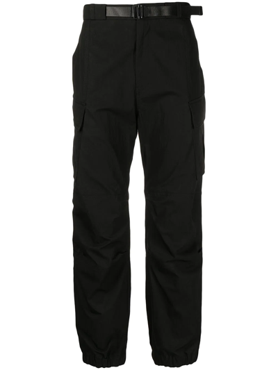 Shop Juunj Tapered-leg Cargo Trousers In Black